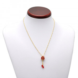 Pendentif perles verre rouge tisse dore renaissance