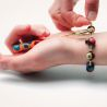 Hulp voor het bevestigen van armband met handvat van murano glas